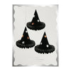 Three black paper witch hats decorated with white and gold stars hang in a vertical row against a white, scalloped-edge background. The packaging reads "Meri Meri Honeycomb Witch Hat Decorations - Final Sale." Perfect for adding a spooky touch to your Halloween decor!