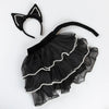 The Meri Meri Cat Costume - Final Sale includes a cat ears headband, black tulle skirt with white pearl trim, and a black tail, all stylishly displayed on a white background.