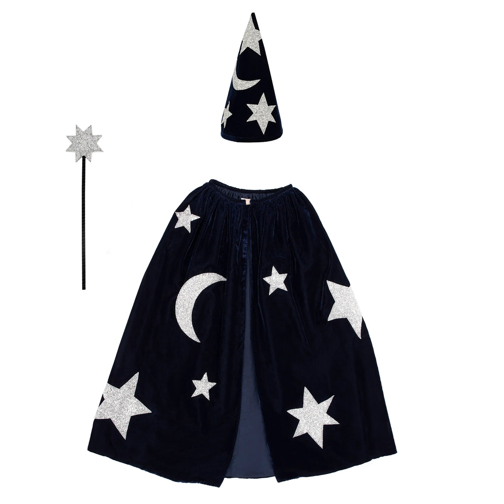 The Meri Meri Blue Velvet Wizard Costume - Final Sale includes a blue velvet cape with silver glitter stars and a crescent moon, a matching pointed hat, and a star-tipped wand, shown on a white background.