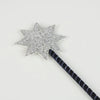 A silver, glittery star wand with a dark handle featuring a spiral white stripe, ideal for finishing the Meri Meri Blue Velvet Wizard Costume – Final Sale, displayed on a plain white background.