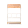 The Milton & Goose Market Stand features a white and light wood design with four open shelves and a light tan fabric canopy, displayed against a plain white background.