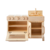 The Milton & Goose Essential Play Kitchen, made in the USA from light-colored wood, features a stovetop with knobs, an oven with opening door, shelves, and a sink with faucet—perfect for imaginative play.