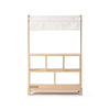 The Milton & Goose Market Stand features a white fabric canopy, open shelves, and a platform base, designed to inspire imaginative play—perfect for use as a kids' play shop.