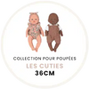 Two 36 cm "Les Cuties" dolls join Minikane Babies. One wears a floral outfit with a headband, the other has striped overalls and a white shirt. Displayed on white background, both are part of the Minikane Doll Clothing collection, featuring the Félicie Set in Cream Knit.