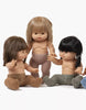 Two Minikane dolls dressed in soft lurex tights in rosewood sit together on a white background. Their outfits, made in France, showcase the Minikane Doll Clothing pack of 2 rosewood tights.