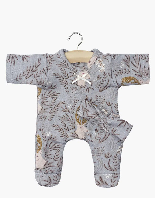 The Minikane 11" Doll Clothing | Élaphe Jersey is a light gray baby romper with long sleeves, woodland-themed leaf and deer designs, and an attached matching hat, hanging on a wooden hanger. Ideal for styling Minikane dolls or your little one.