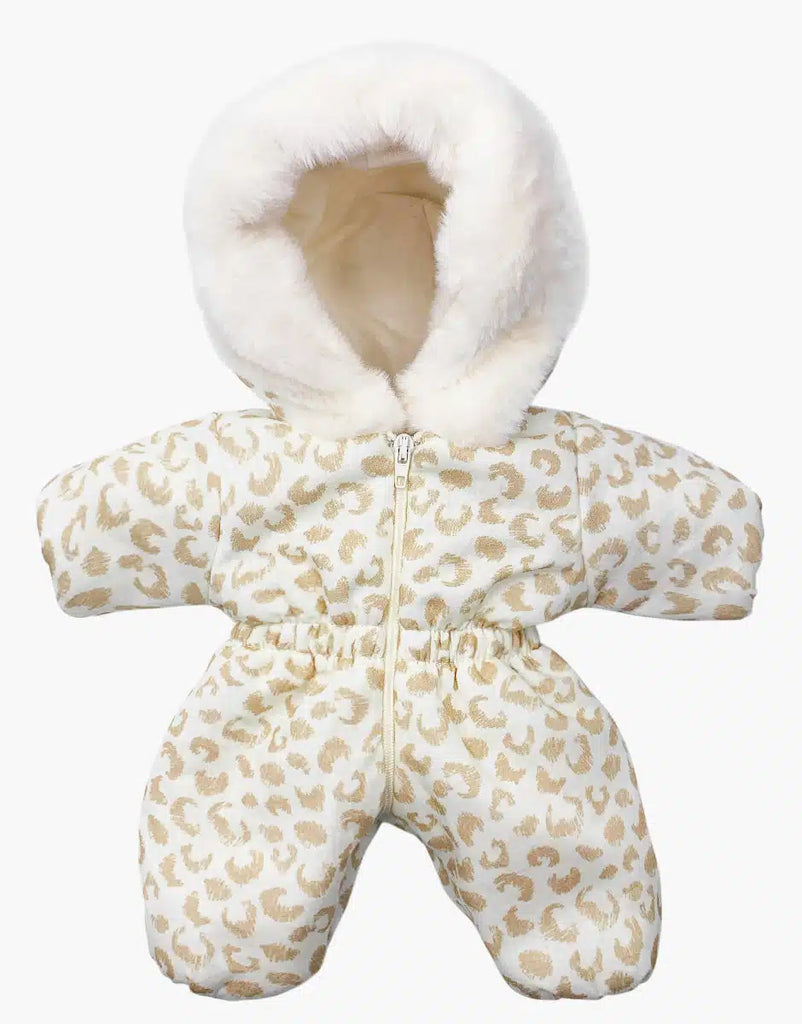 A plush, cozy ski suit for babies featuring a hood with furry trim and a zipper, in white with a light brown animal print reminiscent of Minikane dolls. Known as the Minikane Doll Clothing | Gigi Feline Ski Suit.