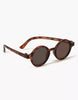 Minikane Doll Accessories | Harry Sunglasses: Round glasses with dark lenses and tortoiseshell brown frames, slightly bent arms, shown on a white background. Stylish accessory for Minikane dolls.