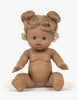 A brown-skinned Minikane Baby Doll (13") - Louise with two small buns of curly blond hair is sitting upright. The doll has blue eyes, chubby cheeks, and is unclothed, showing detailed sculpting of hands, feet, and facial features. It exudes a natural vanilla scent against the plain white background.