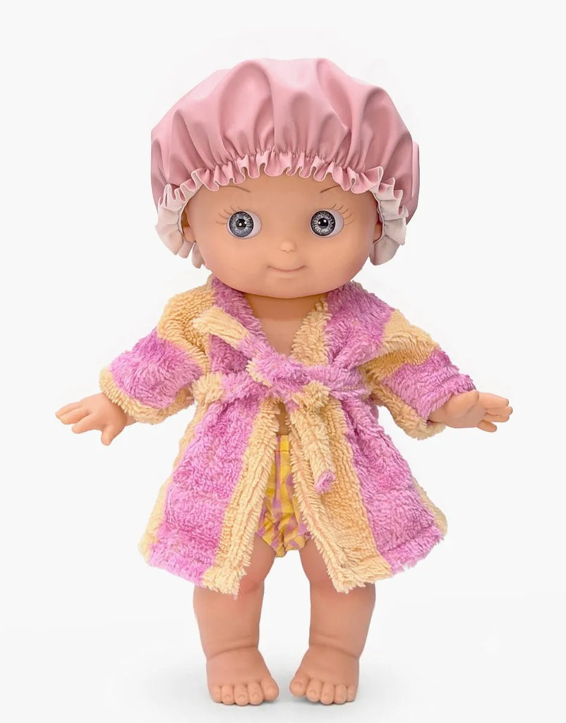 Introducing the Mini Pancha Doll - Alice with Pink Striped Bath Set: a high-quality vinyl doll dressed in a pink shower cap, pink and beige striped bathrobe, and yellow patterned shorts, standing against a white background—perfect for inspiring imaginative play.
