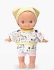 The Mini Pancha Doll - Alice with Unicorn Painting Outfit is a high-quality vinyl doll featuring a yellow hat, a unicorn-patterned shirt with stars, and pink shorts, standing upright against a plain white background—perfect for encouraging imaginative play.