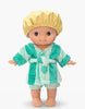 The Mini Pancha Doll - Basile with Green Striped Bath Set features a Paola Reina doll with big eyes, dressed in a yellow shower cap, a green and white striped bathrobe, and matching shorts. Barefoot and posed against a plain white background, this doll is perfect for imaginative play.