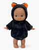 A high-quality vinyl Minikane Mini Pancha Doll - Noah Celebrating with Black Cat Halloween Outfit wearing a fuzzy black hooded outfit with orange cat ears.