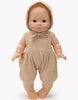 The Minikane Vintage Baby Boy Doll (13") - Louis with Clothing stands upright, wearing a beige hooded romper with a neck bow. This anatomically correct doll features realistic details and visible toes against a plain white background.