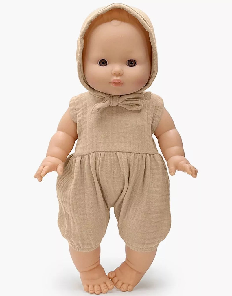 The Minikane Vintage Baby Boy Doll (13") - Louis with Clothing stands upright, wearing a beige hooded romper with a neck bow. This anatomically correct doll features realistic details and visible toes against a plain white background.