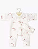 The Minikane 11" Doll Clothing Lili Jumpsuit & Headband in Ribbed Knit - Pink Hearts features a white onesie with pink hearts and a matching knotted headband, perfect for dressing up your Minikane doll.
