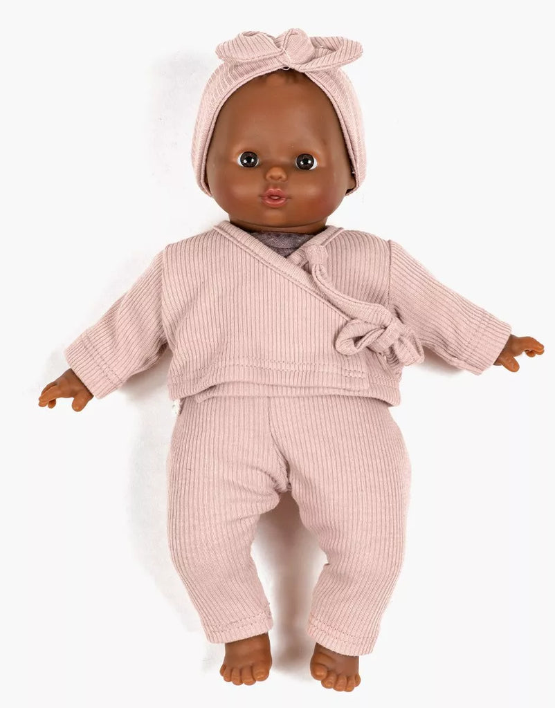 The Minikane 11" Doll Clothing | Raxane Wrap Set & Headband in Ribbed Knit - Petal Pink includes a stylish light pink wrap top, matching pants, and bow headband—perfectly sized for Minikane dolls and made in France.