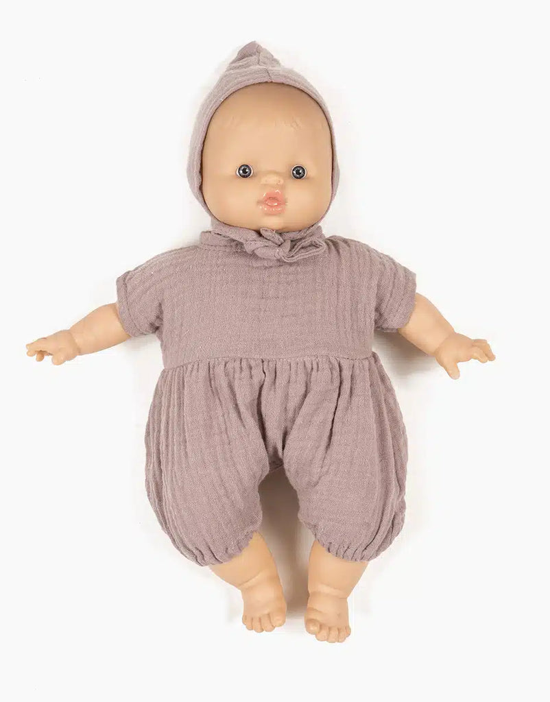 A Minikane Clothing | Romper and Bonnet Set with light skin, wearing a purple knit romper and matching bonnet. This 11" doll has a neutral facial expression, and its arms and legs are slightly spread apart. The background is plain white.