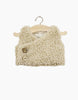 The Minikane Doll Clothing | Babies – Terry Sleeveless Vest - Beige is a textured, cream-colored, sleeveless vest with two front buttons—ideal for Minikane dolls or baby doll clothes collections. Displayed on a wooden hanger against a white background.