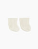 A pair of white, ribbed Collégien cotton socks are displayed against a plain white background. The socks, perfect as doll accessories, are positioned next to each other with the toes facing to the right. The ribbed texture is visible, giving these Minikane Doll Clothing | Beige Cotton Doll Socks a stretchy appearance.