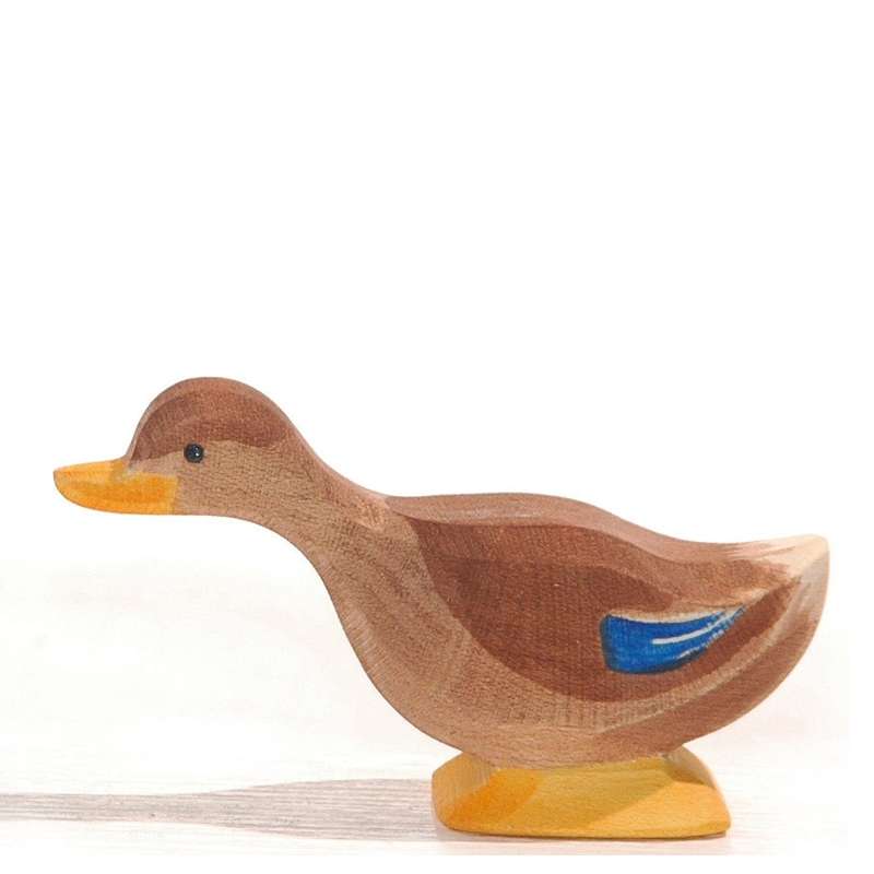 A handcrafted Ostheimer Long Neck Duck figurine with a natural finish and painted details in blue and orange, set against a plain white background.
