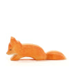 Ostheimer Small Fox - Creeping figurine, intricately carved and handcrafted as an Ostheimer toy, painted in shades of orange, isolated on a white background.
