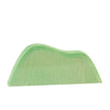 A simple handcrafted Ostheimer Bush painted green, shaped like a small hill or mound, against a white background.