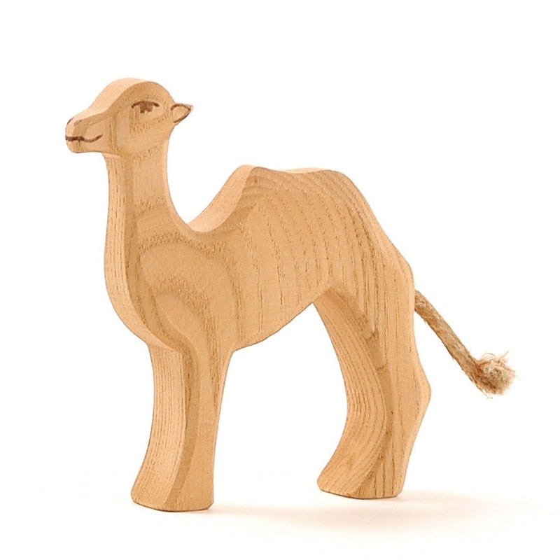 The Ostheimer Small Camel features simple carved details, a rope tail, and a smooth natural finish—perfect for imaginative play and an ideal addition to any collection of handcrafted wooden toys.