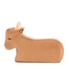 A handcrafted Ostheimer Ox shaped like a simplistic, stylized unicorn, with noticeable wood grain and etched features, isolated on a white background.