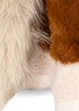 Close-up of a Konges Sloejd Fiona Horse toy featuring long, cream-colored faux fur next to short, brown and off-white patches of plush fabric.