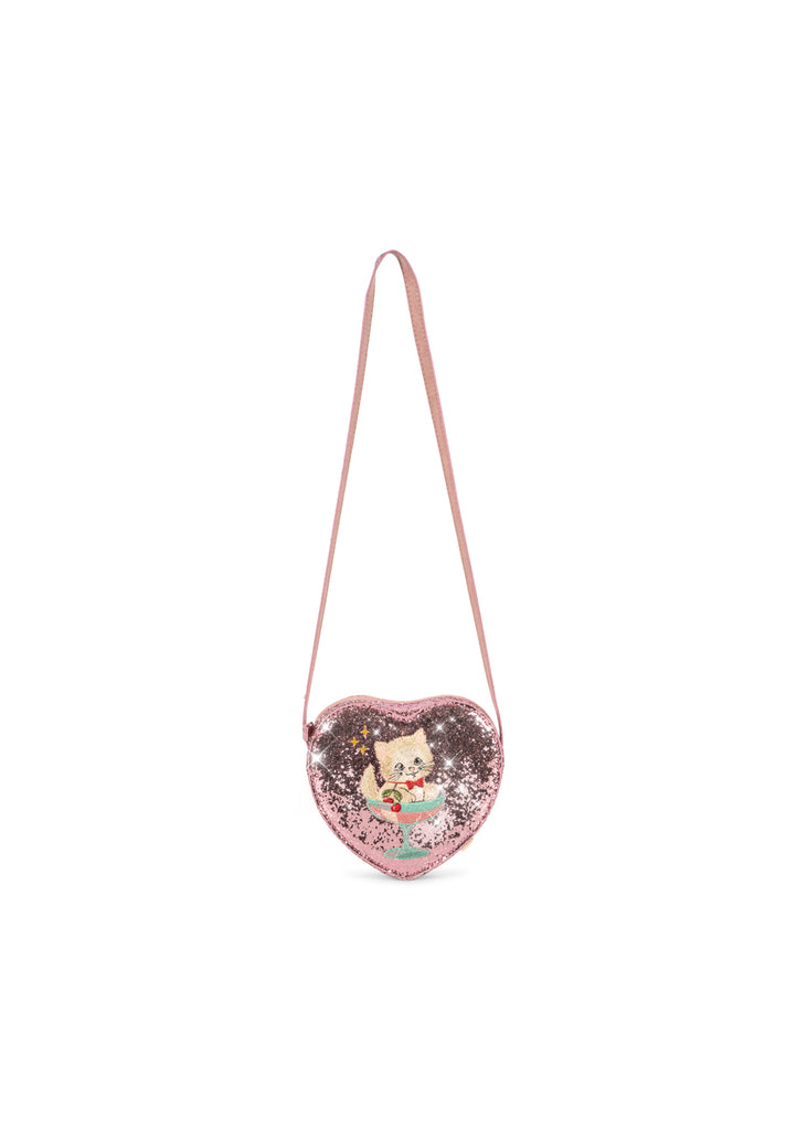 Pink heart-shaped Konges Sloejd Tut Kitty Shoulder Bag featuring a sequined illustration of a kitten sitting in a cocktail glass.