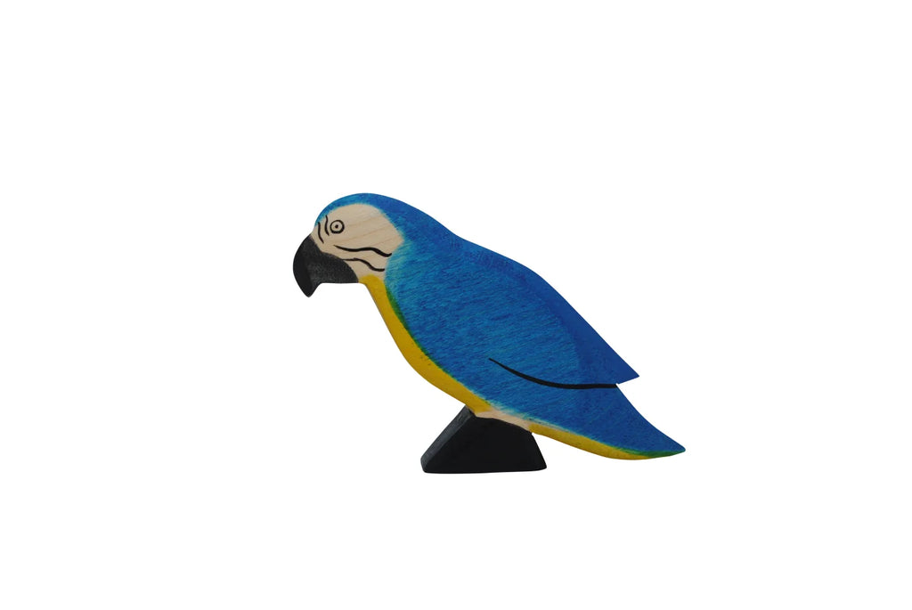A colorful wooden Handmade Holzwald Blue Parrot figurine with blue, yellow, and black plumage, standing on a black base, isolated on a white background. This sustainable toy adds an eco-friendly touch to playtime.