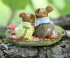 The Wee Forest Folk Tiny Collectible - Just the Two of Us features two hand-sculpted mouse figurines in picnic attire, sitting on a red-checkered blanket atop tree bark, surrounded by greenery and picnic items. Not a toy.