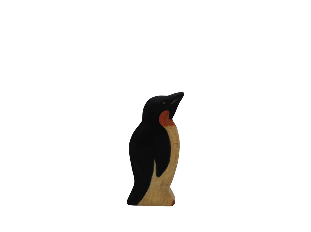 The Handmade Holzwald Penguin, Head Up features a black back, head, and beak with orange neck details and a natural wood belly—an adorable addition to any wooden toy collection.
