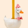 The Pink Goose Cake Topper – Final Sale features a charming white ceramic goose figurine adorned with a pink polka-dotted party hat and pink bow tie, complete with a yellow candle on its back, making it an adorable handcrafted birthday decoration or porcelain cake topper perfect for festive celebrations against a light background.