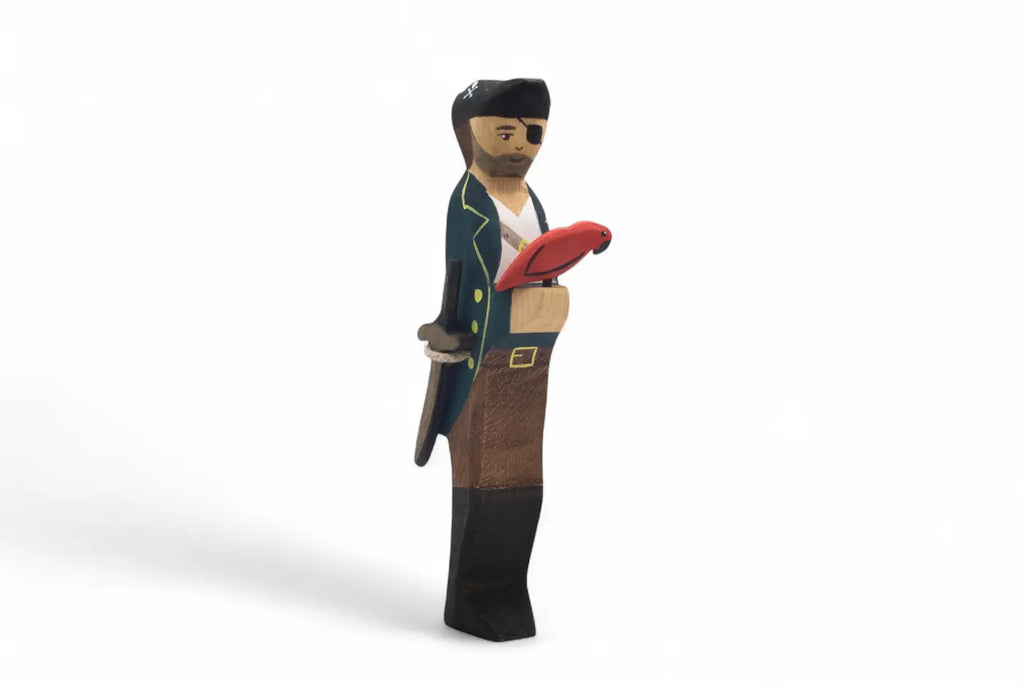 The Handmade Holzwald Pirate and Parrot features a pirate with eye patch, green coat, sword, and red parrot—an adventurous, sustainable addition to your toy collection.