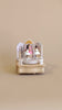 The wooden ballerina music box in motion with soft melody playing.