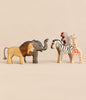 Handmade Holzwald Safari Animals Set featuring wooden lion, elephant, zebra, monkey, and giraffe figurines.