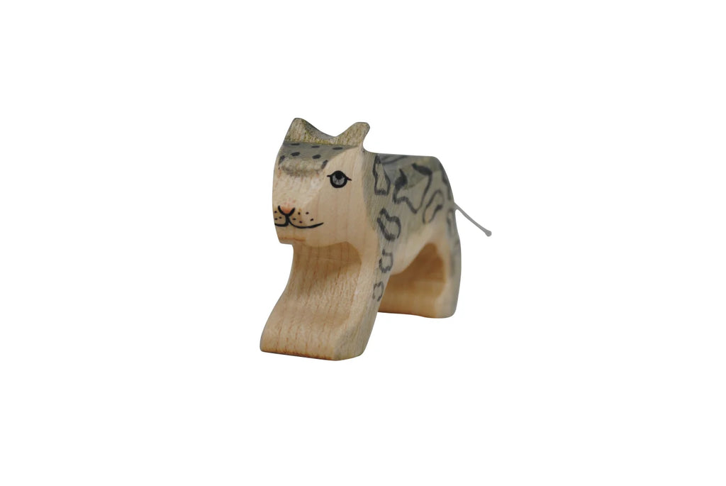 A wooden toy figure of a Snow Leopard, hand-painted with stripes, standing against a white background. This educational toy promotes learning through play.