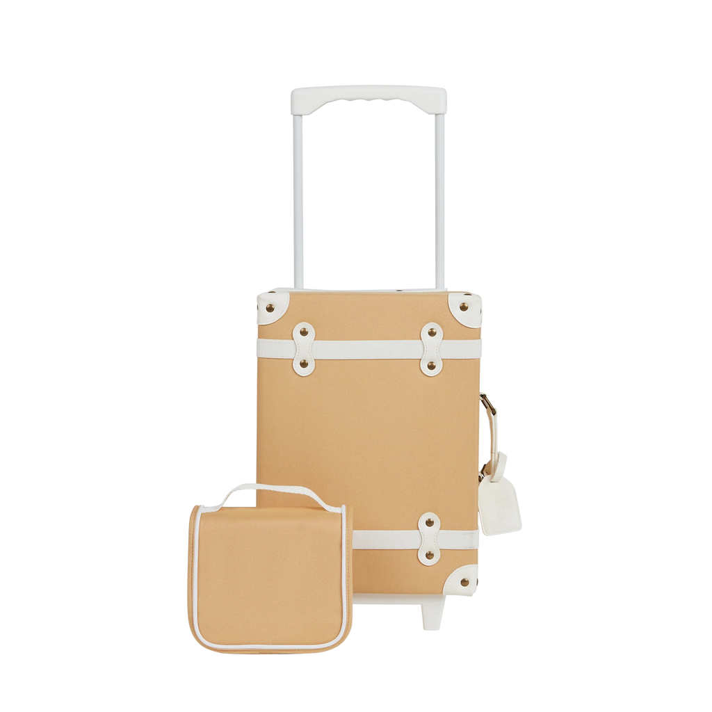 Elegant beige Olli Ella See Ya Wash Bag - Butterscotch and matching carry-on with white trim details, displaying a simplistic yet luxurious design, set against a plain background, ideal as a travel buddy for kiddos.