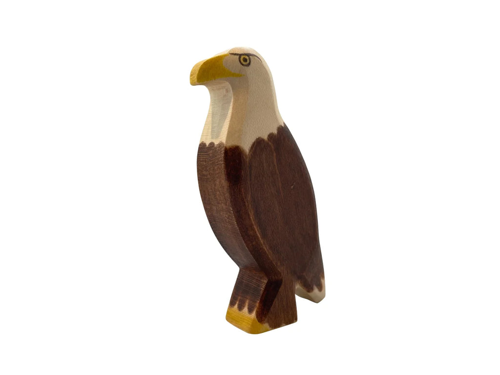A Handmade Holzwald Eagle, standing upright with a prominent beak and painted details, isolated on a white background.