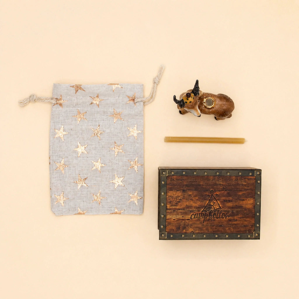 A Stag Cake Topper, offered as a final sale item, is arranged on a beige background.