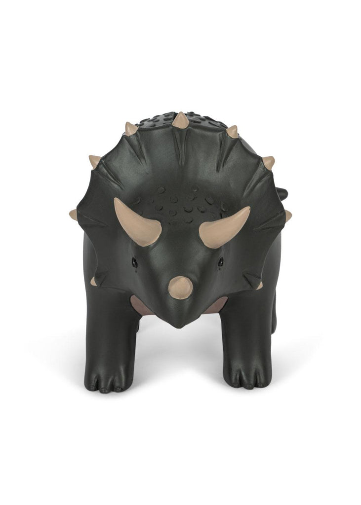 The Konges Sloejd Money Bank - Dino is a black and gray triceratops with beige horns and spikes, serving as both a playful toy and a decorative piggy bank for saving money.