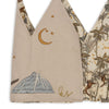 The Konges Sloejd Birthday Crown - Dino is a beige cotton crown with a tropical print background featuring monkeys, palm trees, and gold stars, plus embroidered crescent moon, blue mountain, yellow "LS" initials, and stars.