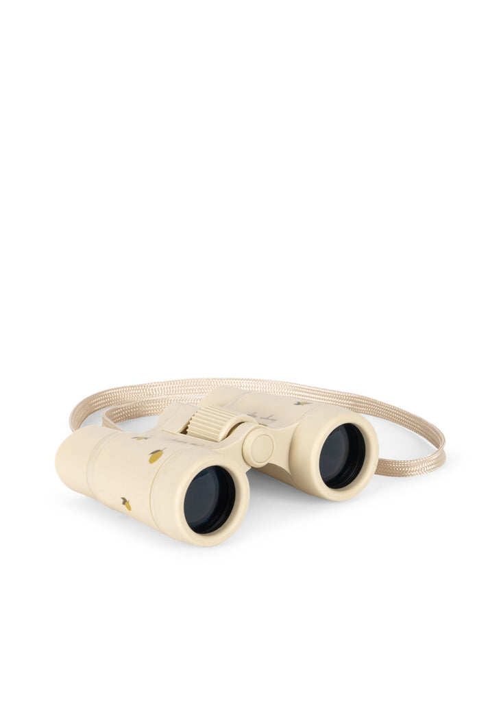 Konges Sloejd Explorer Binoculars - Lemon: Lightweight beige binoculars with a matching strap, adjustable focus, and small yellow and brown leaf designs, displayed on a white background.