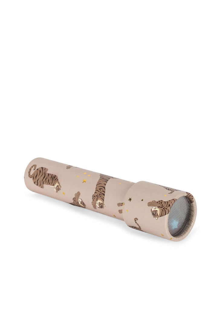 The Konges Sloejd Kaleidoscope - Tiger is a beige children's kaleidoscope featuring tiger illustrations and yellow stars, shown on a white background.