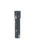 The Konges Sloejd Kaleidoscope - Lucia features a cylindrical design with a dark blue background, adorned with stars, moons, and children’s illustrations. Crafted from FSC-certified materials, it contains colorful pearls inside.