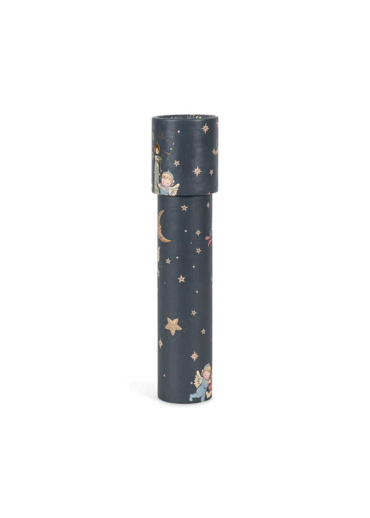 The Konges Sloejd Kaleidoscope - Lucia features a cylindrical design with a dark blue background, adorned with stars, moons, and children’s illustrations. Crafted from FSC-certified materials, it contains colorful pearls inside.