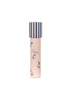 The Konges Sloejd Kaleidoscope - Rock My Boat is a pink cylinder featuring navy blue anchors, seahorses, and “Sailor.” Its navy and white striped top contains colorful pearls that shimmer as you turn the kaleidoscope.