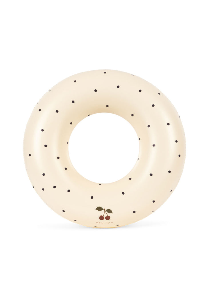 The Konges Sloejd Junior Swim Ring - Navy Dot is a stylish inflatable swim ring with small navy dots, ideal for kids to enjoy fun moments in the pool.